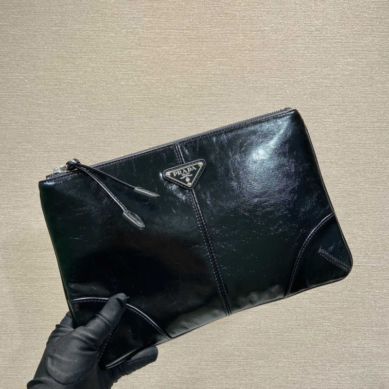 Pra*a clutch bags